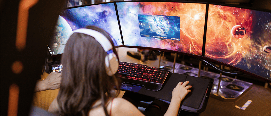 Woman gaming on an ultrawide monitor