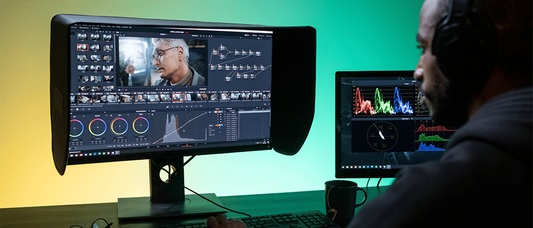 Man editing photos on a monitor